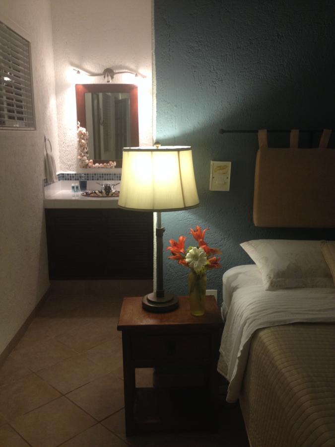 Villa Escondida Guest House Cozumel Downtown Bagian luar foto